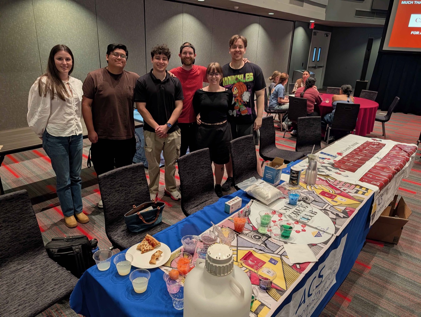 CSUN Chemistry Club members hosting a colorful hands-on activity table